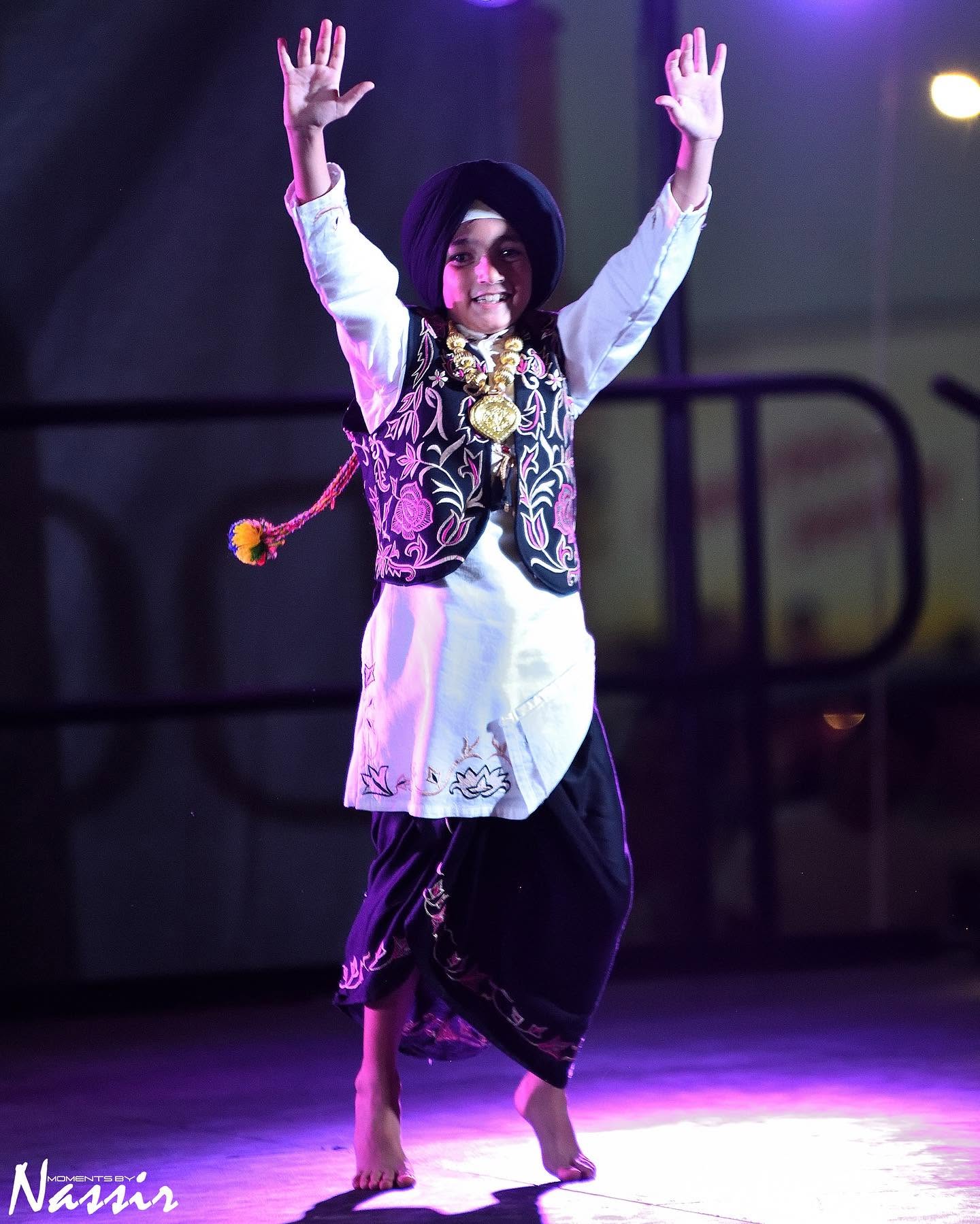 KC Bhangra student performing on stage